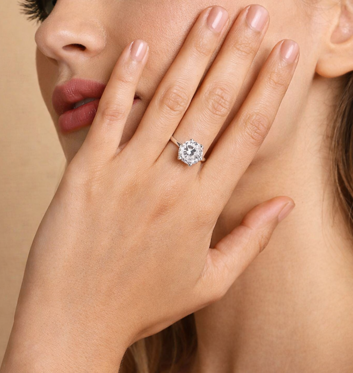 Close-up of a hand wearing a diamond ring
