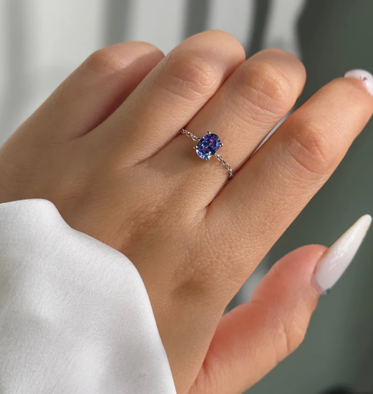 adjustable gold chain ring with tanzanite stone