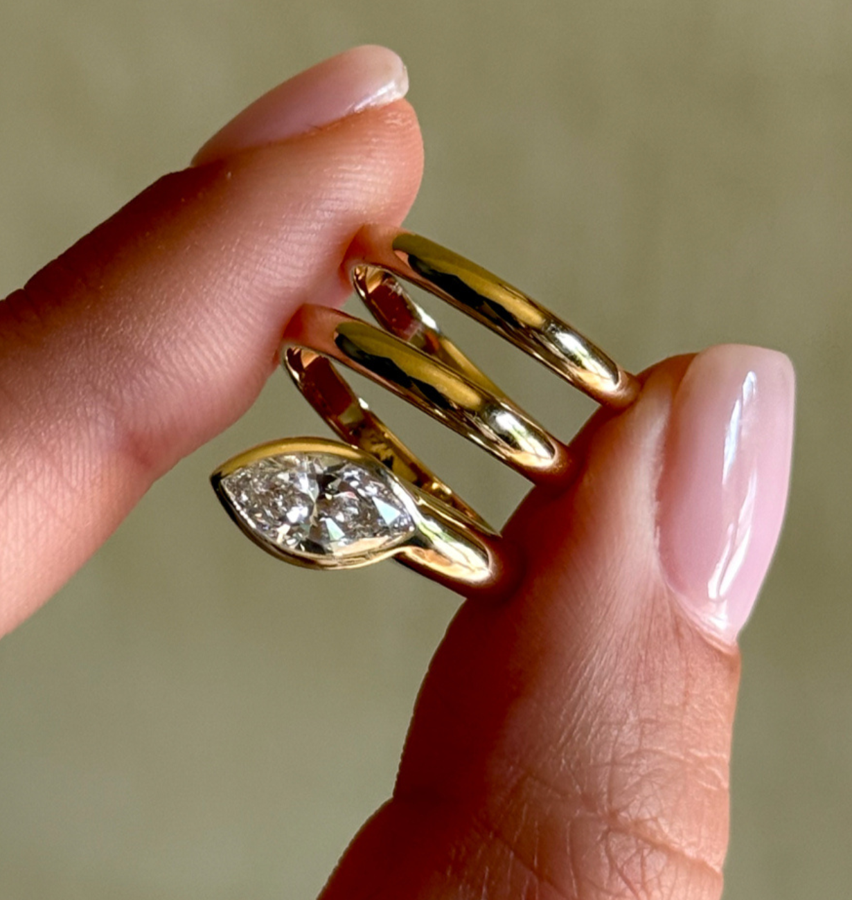 isara marquise lab grown diamond engagement ring with bezel setting in 14k gold