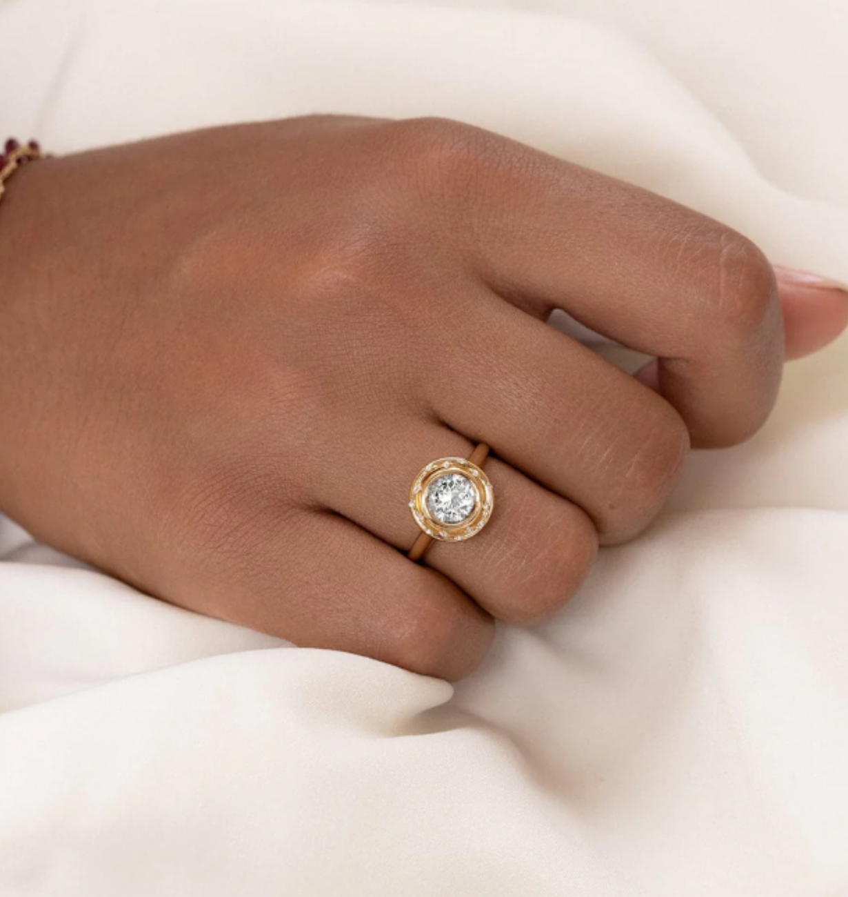 side view of spotlight lab grown diamond ring with accent stones