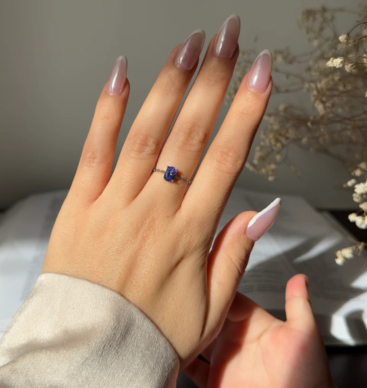 tanzanite birthstone chain ring in 14k gold