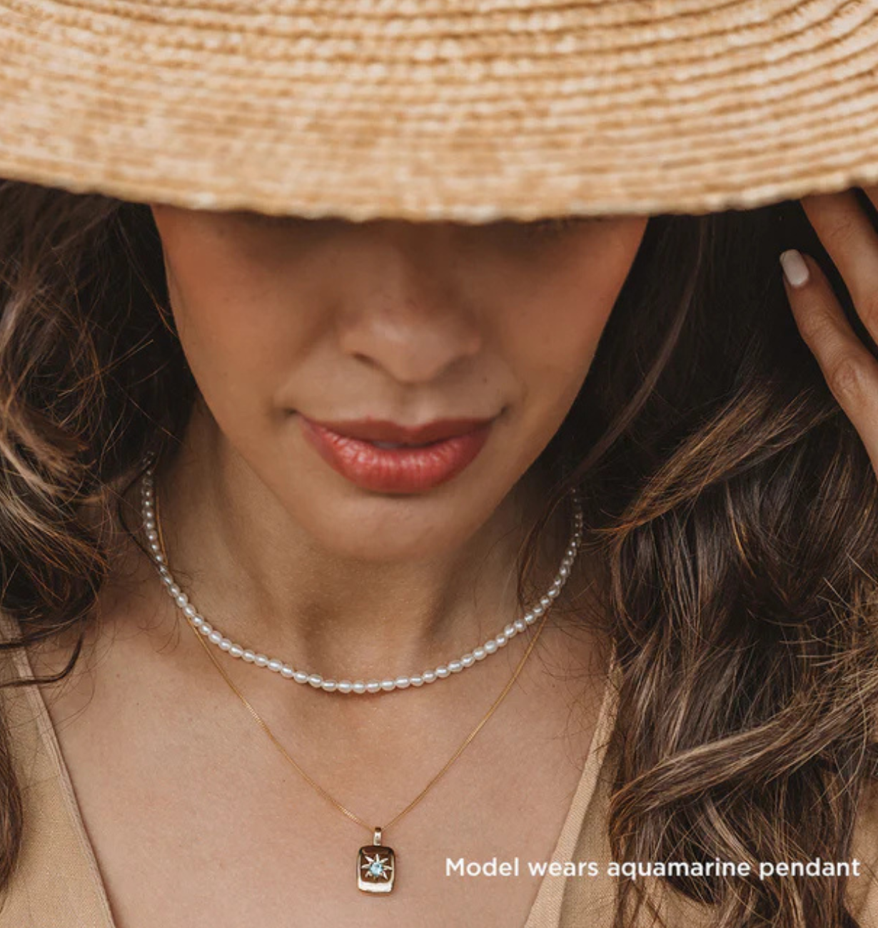Elegant rectangular pendant with ruby center