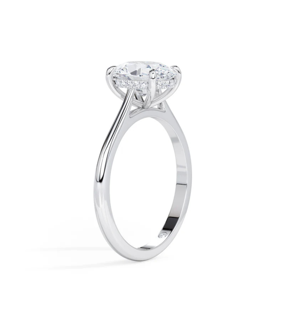 Side profile of the LAMA Oval Engagement Ring with slim white gold band