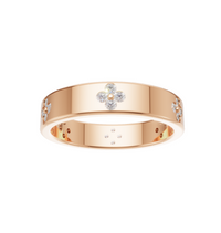 Rose gold ring with embedded diamonds 