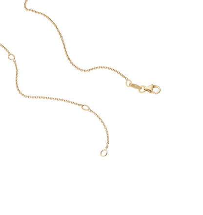 angled view of gold link bracelet with polished finish