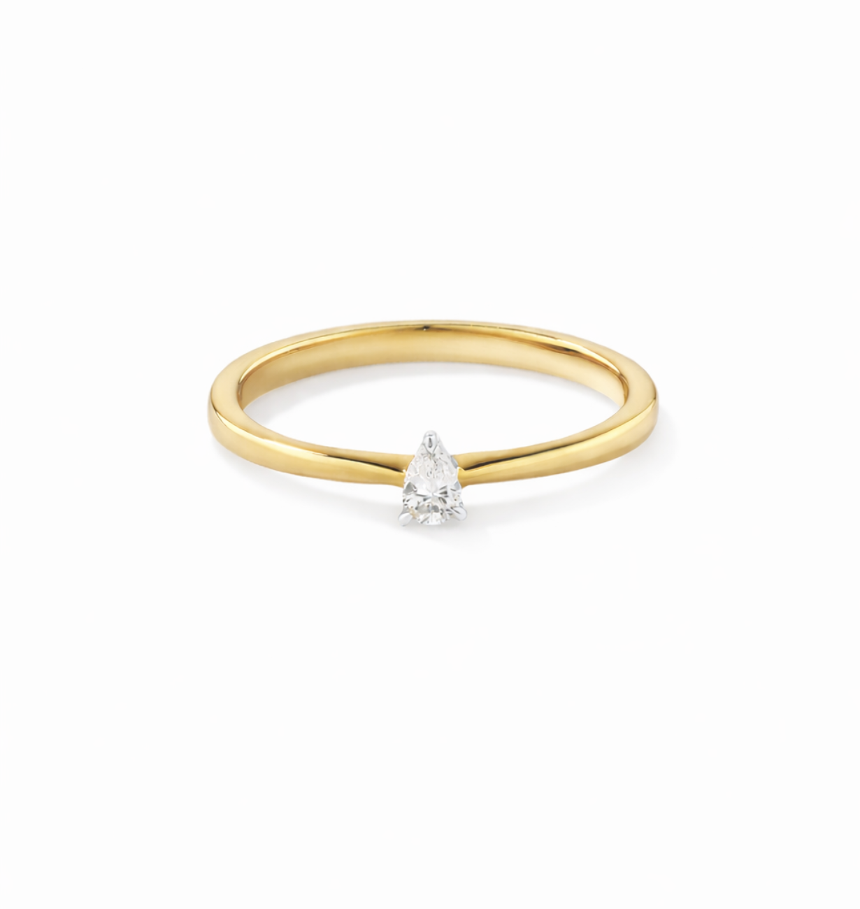 angled view of pear lab grown diamond solitaire ring in gold