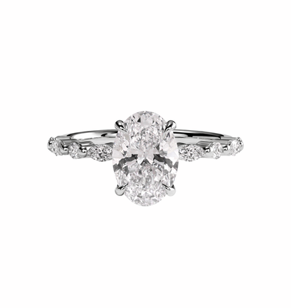 close-up of oval lab grown diamond ring with hidden halo in 14k gold