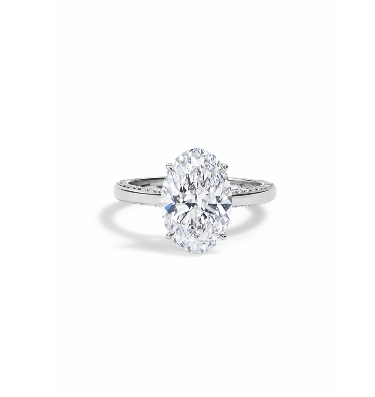 oval lab grown diamond engagement ring with hidden pave floral design in 14k gold