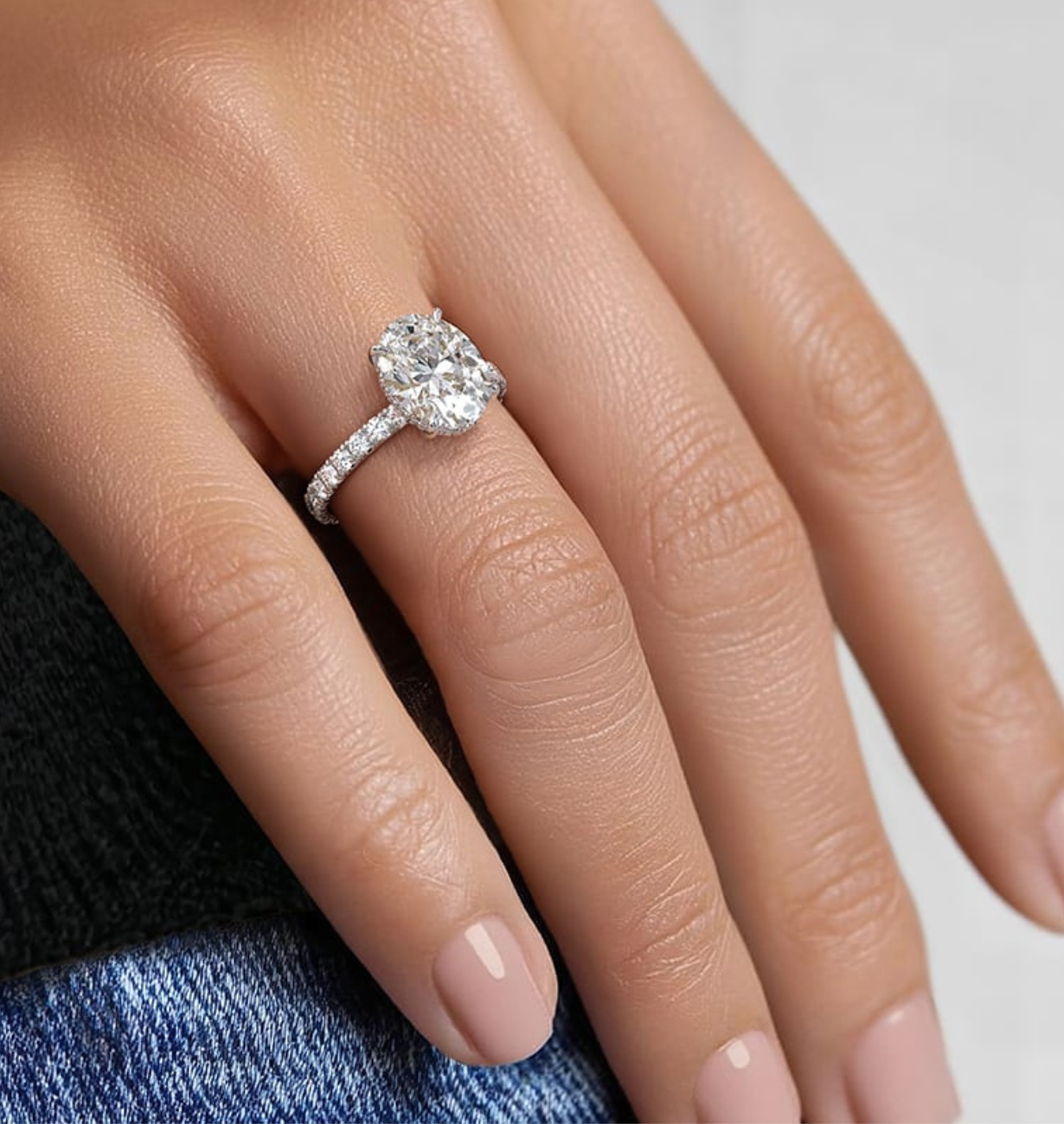 oval lab grown diamond engagement ring with pave band in 14k gold